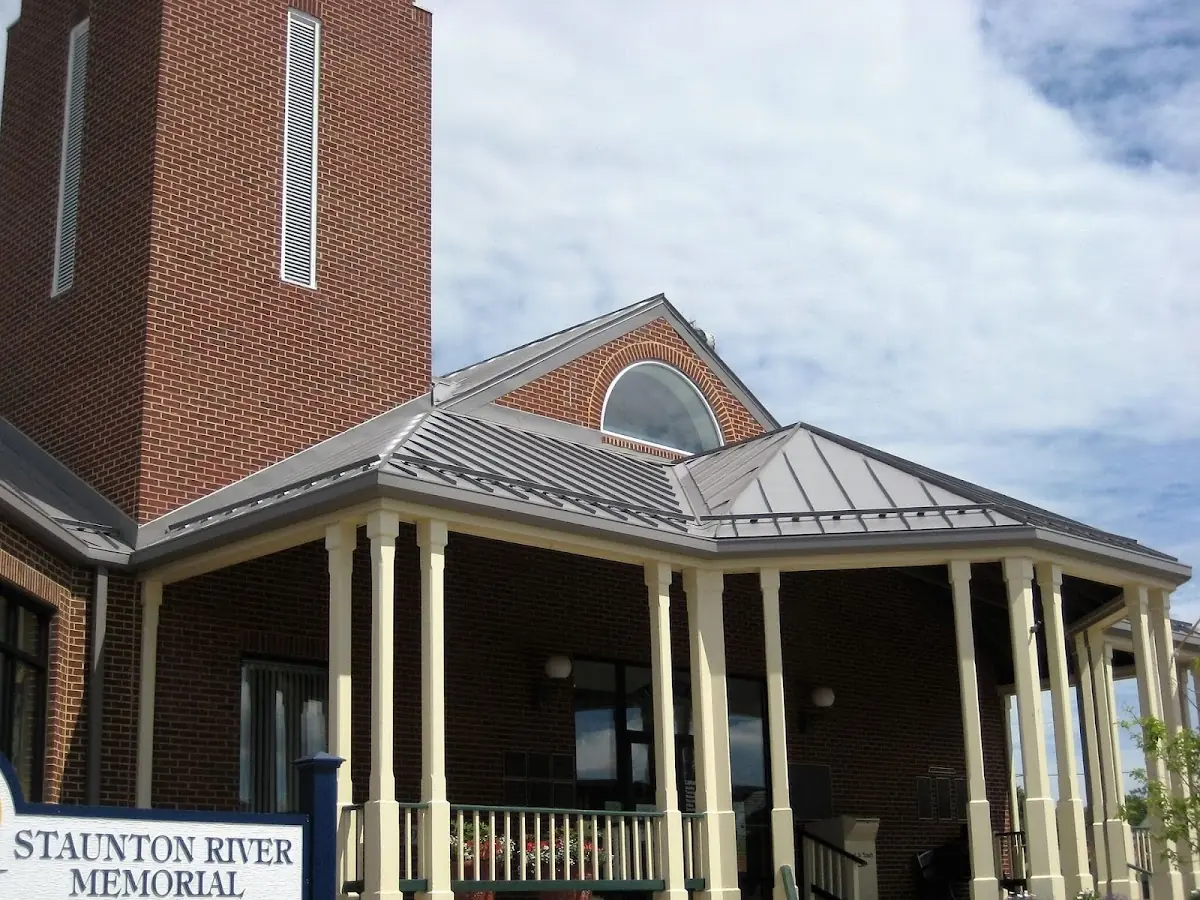Skilled roofing craftsmen working on a residential roof in Stovertown